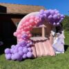 Encanto bounce house balloon garland