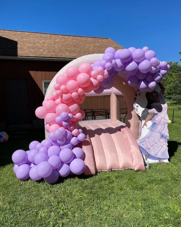 Encanto bounce house balloon garland