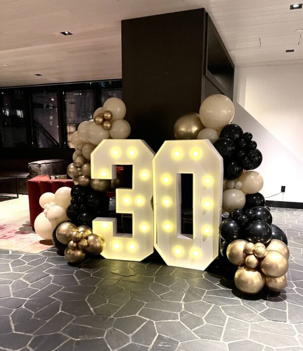 30 marquee numbers and balloon garland in beige black and gold