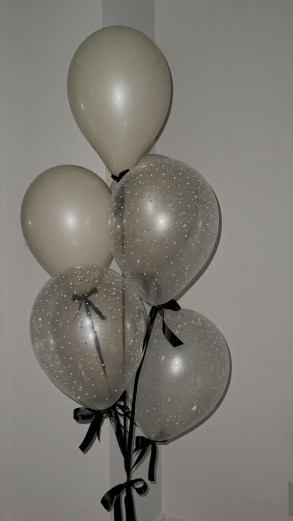 Ivory and black balloons