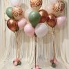 giraffe print with oink and rose gold ballooons.