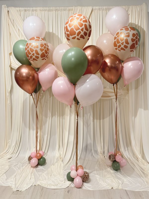 giraffe print with oink and rose gold ballooons.